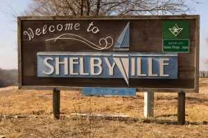 Sign showing new residents and passers by Welcome to Shelbyville