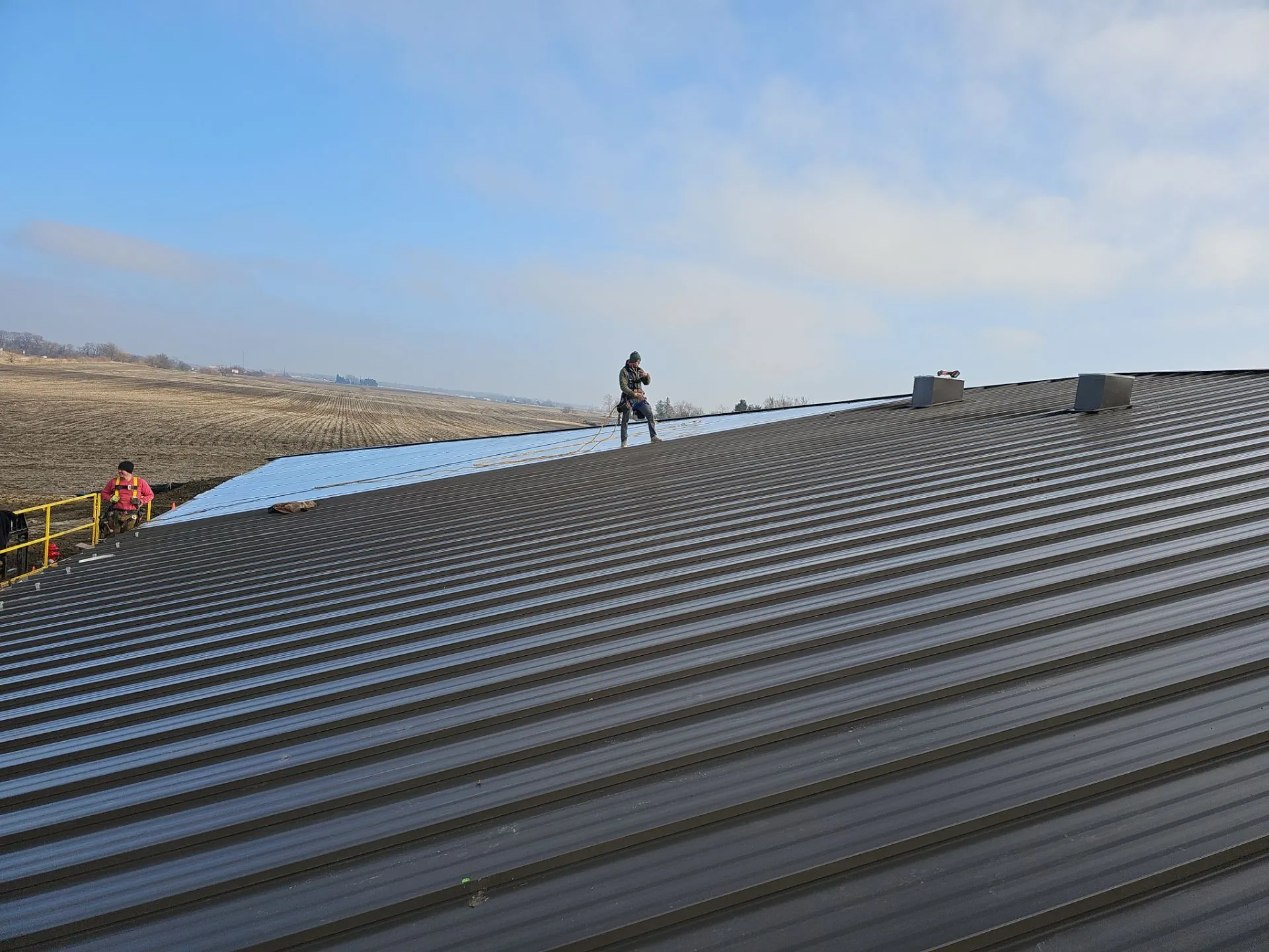 26-gauge Standing Seam concealed fastener metal roof installed on the Farm Credit Building in Mahomet, IL.